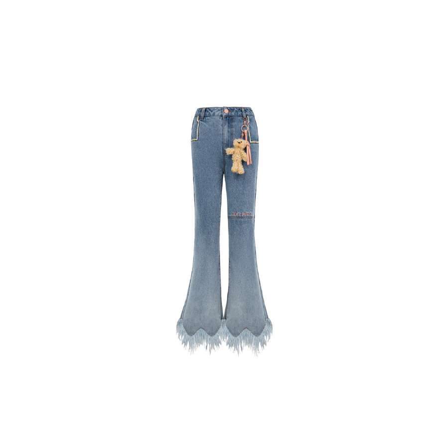 Jeans with store tassels on bottom